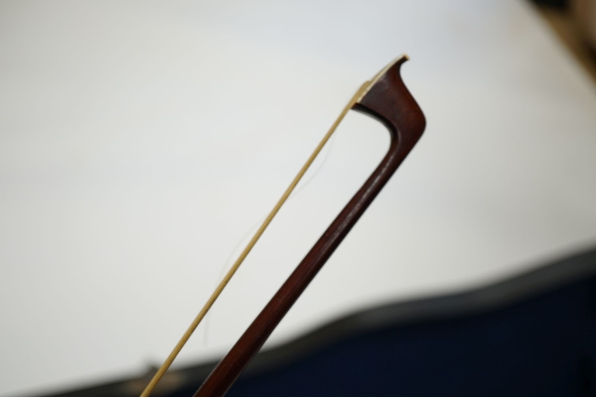 A Maidstone violin, with bow, cased., violin 59 cms high.